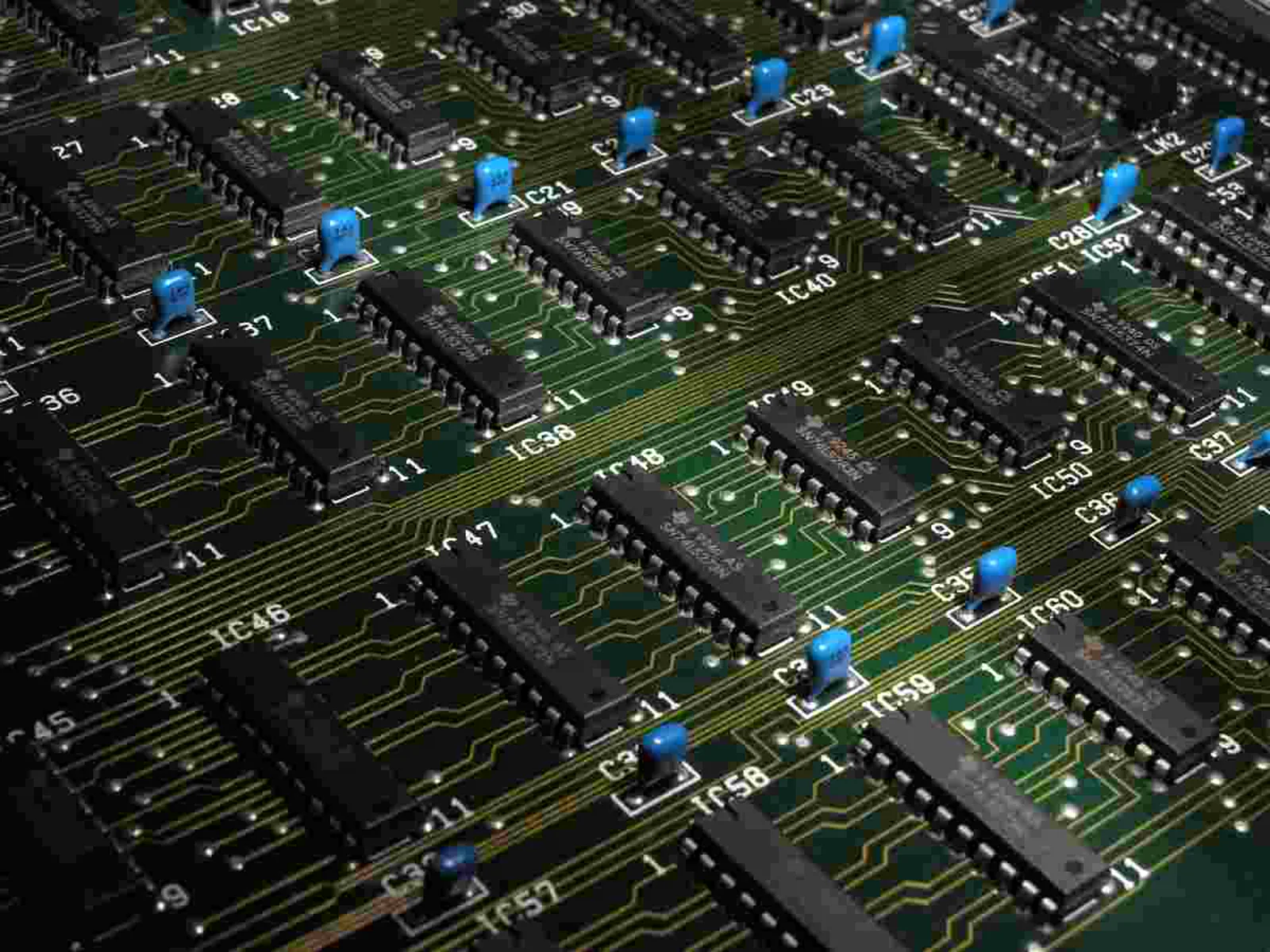 Macro view of a circuit board representing connected manufacturing systems integration